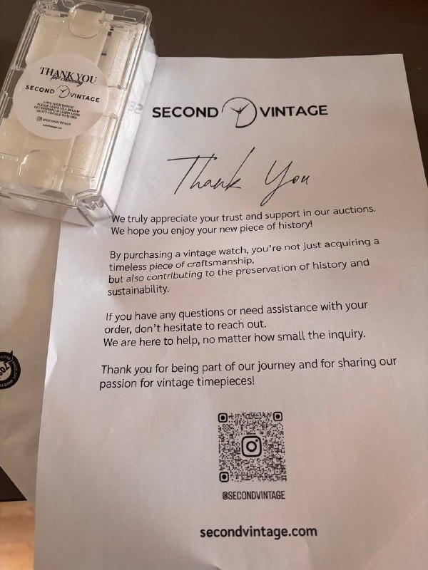 Second Vintage thank-you letter next to the sealed watch case a buyer received