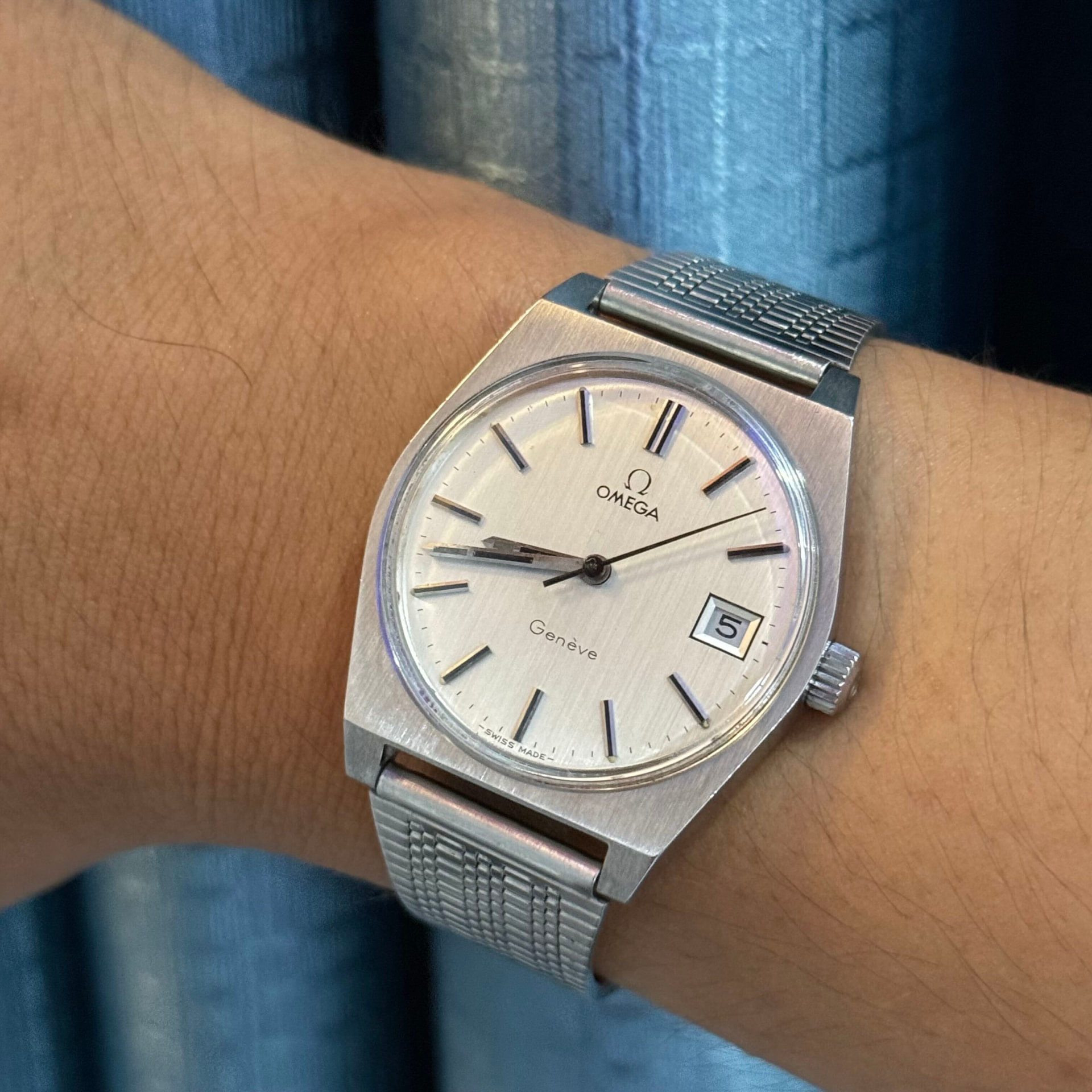 Buyer wearing a vintage Omega Geneve on a steel bracelet