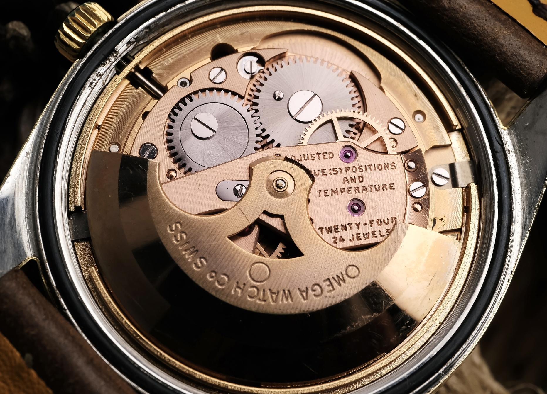 Omega automatic movement showing Geneva stripes and jewel settings