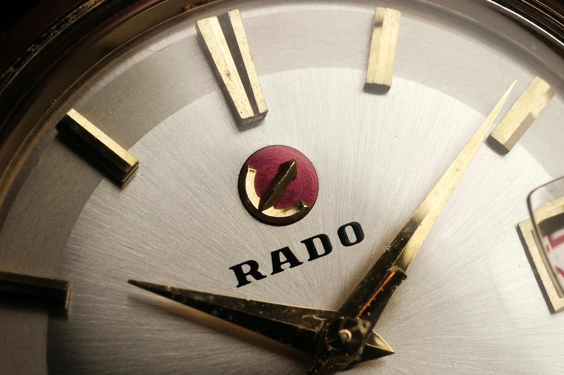 Rado dial closeup with anchor logo